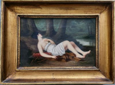un tableau représentant une femme allongée sur une couverture dans les bois