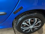 a close up of a car tire with a sticker on it