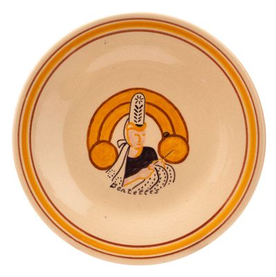 a plate with a picture of a woman holding a basket of fruit