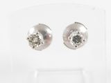 pair of diamond stud earrings in white gold with diamonds
