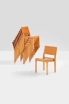 a lot of chairs that are arranged in a row