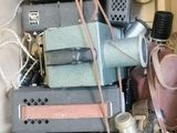 a cardboard box filled with electronics and other items