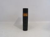a black book that is sitting on a table