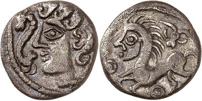 a silver coin with a woman ' s face on it