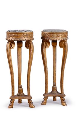 pair of carved wood pedestals with marble tops