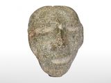 an image of a stone head is shown on a white background