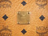 mcm mcm monogram leather wallet in brown
