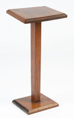an image of a small wooden table with a square top
