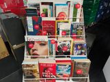 a lot of books that are on display in a store
