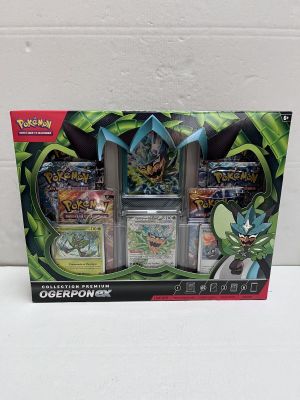 une boîte de cartes Pokémon posée sur une table