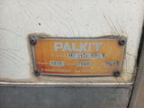 a rusted sign on the door of a vehicle