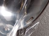 a close up of a spoon and a spoon in a plastic bag
