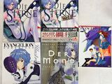 des livres d'anime posés sur une table, sur fond blanc, avec une photo en noir et blanc