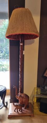 a lamp that is sitting on a table in a living room