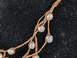 a close up of a necklace on a mannequin mannequin mannequin mannequin mannequin mannequin mannequin mannequin