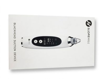 une boîte blanche contenant un appareil électronique noir et blanc