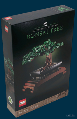 une boîte de Lego contenant un bonsaï