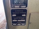 une pancarte apposée sur le côté d'une machine sur laquelle est inscrit « Rotex »