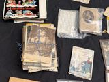 a table with a lot of cards and other items on it