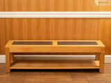an image of a wooden coffee table with a glass top