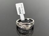 an image of a couple of rings sitting on top of a table