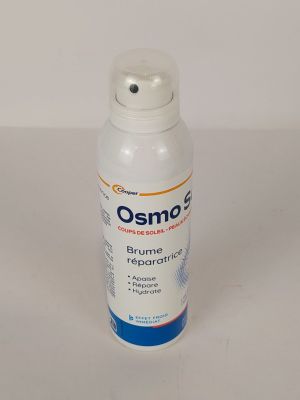 a close up of a bottle of osmo on a white surface