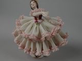 porcelain figurine of a ballerina in a pink and white dress