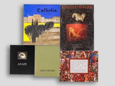 four books are stacked on top of each other on a white surface