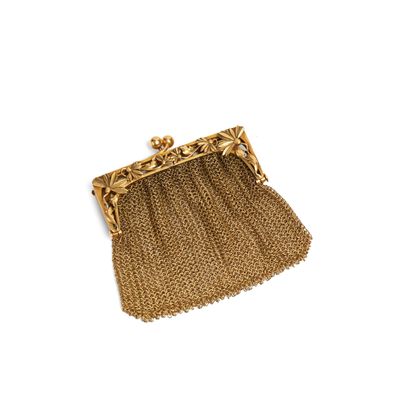 an antique gold mesh purse with a chain handle