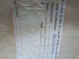 a label on the back of a chair that has a price tag attached to it