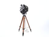 a camera on a tripod on a white background