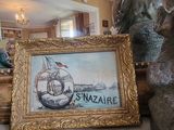 a picture of a statue of a man and a picture of a ship