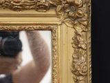 a man taking a picture of himself in a mirror