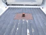 an image of a truck bed with a rusted bed