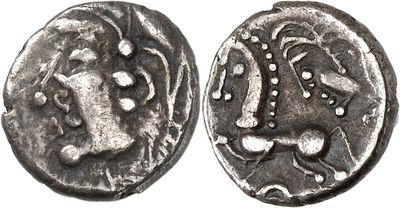 a close up of a coin with an image of a man on it