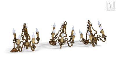 four light wall sconces in the shape of a chandelier