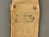 a close up of a small piece of cloth with writing on it