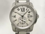 a close up of a wrist watch with roman numerals
