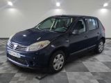a picture of a small blue car parked in a garage