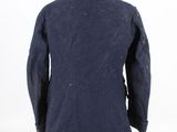 the back of a blue jacket on a mannequin mannequin
