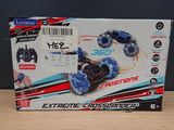 the box of a remote controlled toy car is on a table