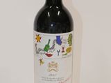 a bottle of wine that is sitting on a table