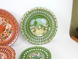 three plates that are sitting on a table