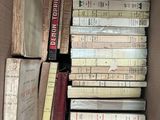 a box full of books that are sitting on the floor