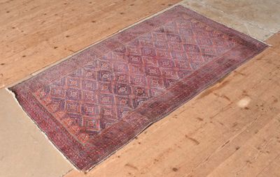 a rug on the floor in the middle of the room