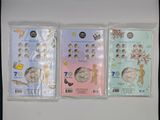 four different types of stamps in plastic bags on a white surface