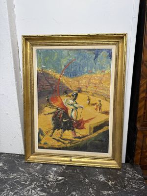 tableau représentant un homme à cheval, une épée à la main, dans un cadre doré