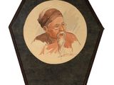 an old picture of a man with a beard in a wooden frame