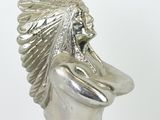 silver plated figurine of a native american woman with a feather headdress