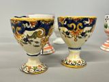three cups sitting next to each other on a table